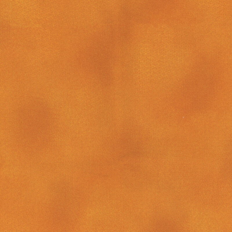 mottled tannish orange fabric