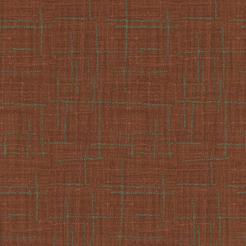 Photo of brown fabric featuring textured lines and teal dots