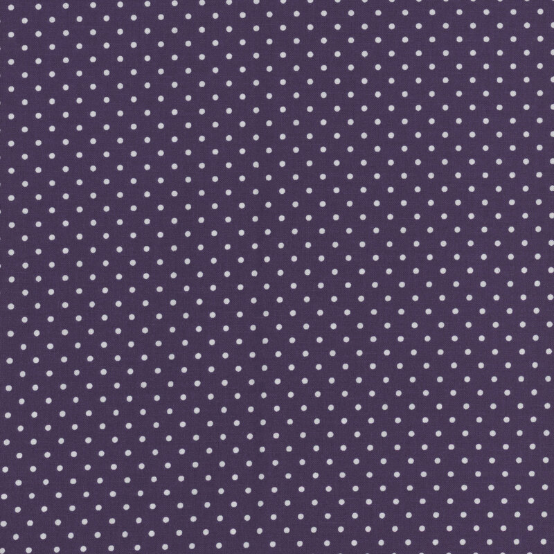 Royal purple fabric with white polka dots.