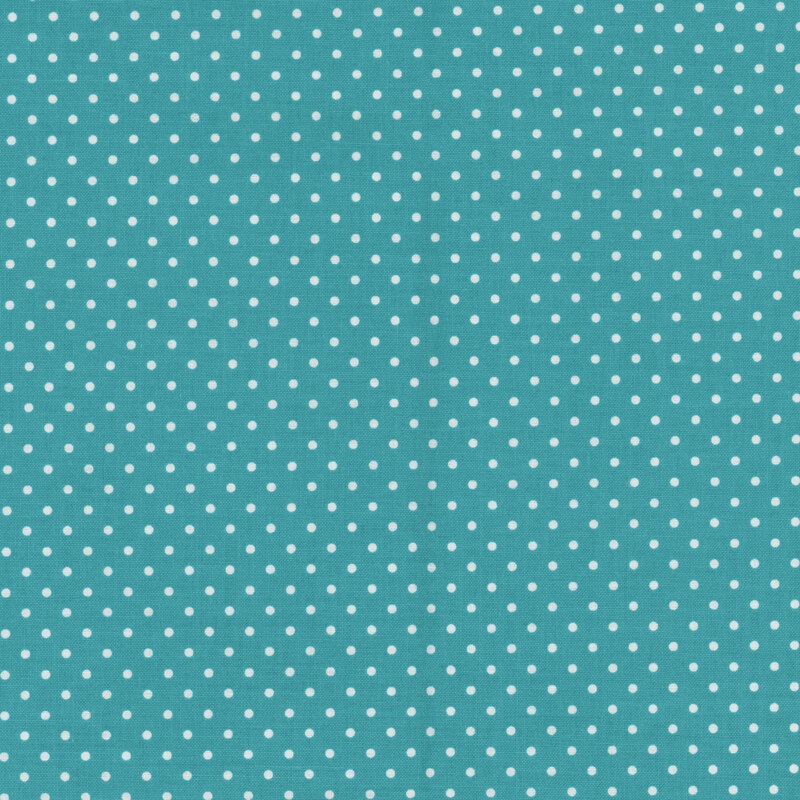 Bright aqua fabric with white polka dots.