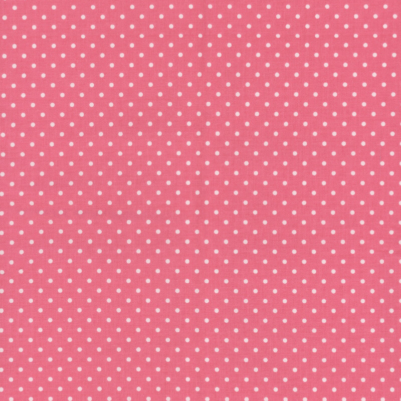 Bubblegum pink fabric with white polka dots.
