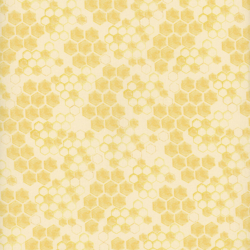 Pastel yellow fabric featuring a honeycomb design