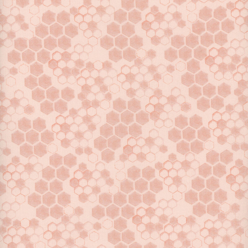 Pastel pink fabric featuring a honeycomb design