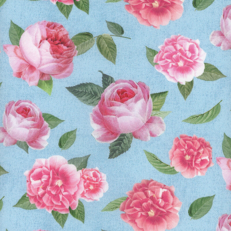 Fabric with a pattern of tossed pink roses on a soft blue background.