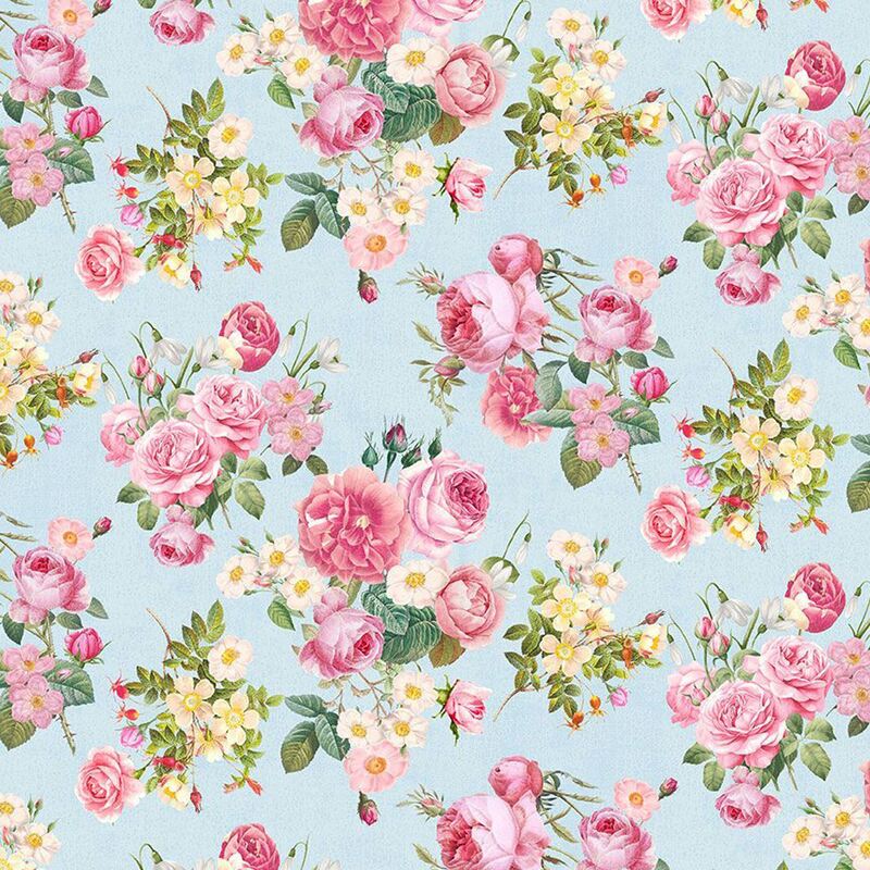 Fabric with a pattern of bouquets of roses, snowdrops, apple blossoms, and red buds on a blue background.