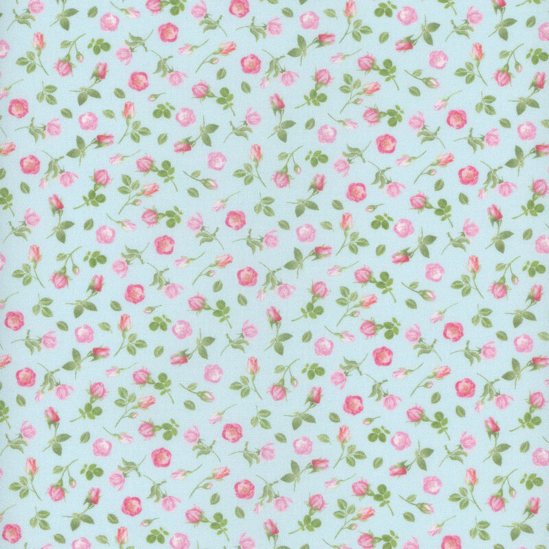 Fabric with a pattern of tossed pink rose sprigs on a soft blue background.