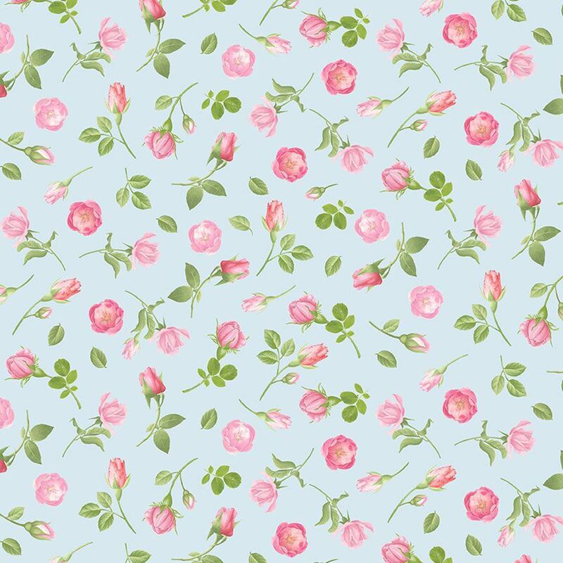 Fabric with a pattern of tossed pink rose sprigs on a soft blue background.