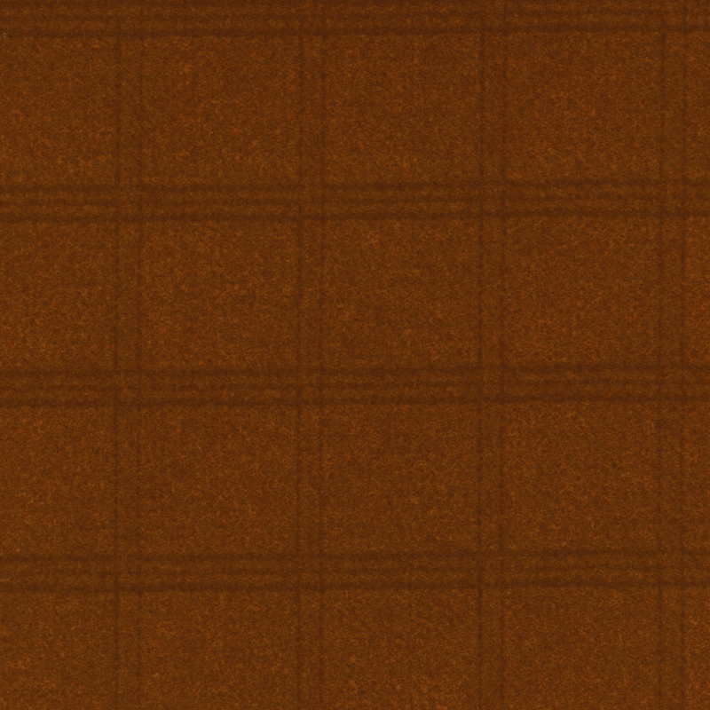 muted orange flannel fabric with darker tartan plaid patterning