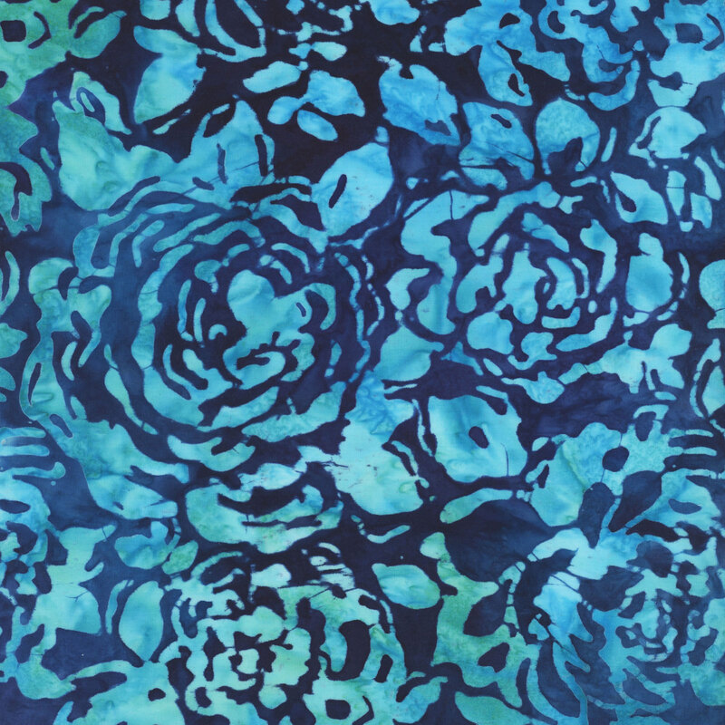 Dark blue mottled fabric with aqua rose silhouettes all over