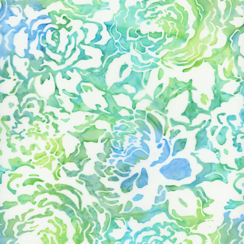 Blue and green mottled fabric with white rose silhouettes all over