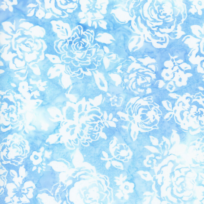 Blue mottled fabric with white rose silhouettes all over