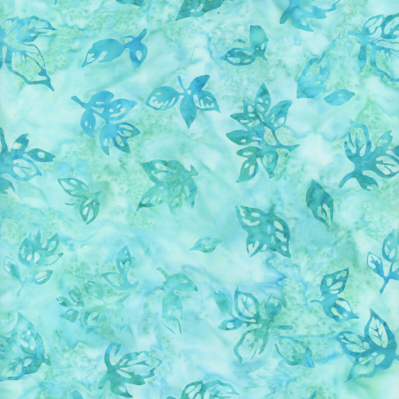 Aqua mottled fabric with teal leaf silhouettes all over
