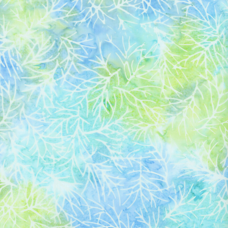 Light blue and green mottled fabric with tossed white branch silhouettes all over