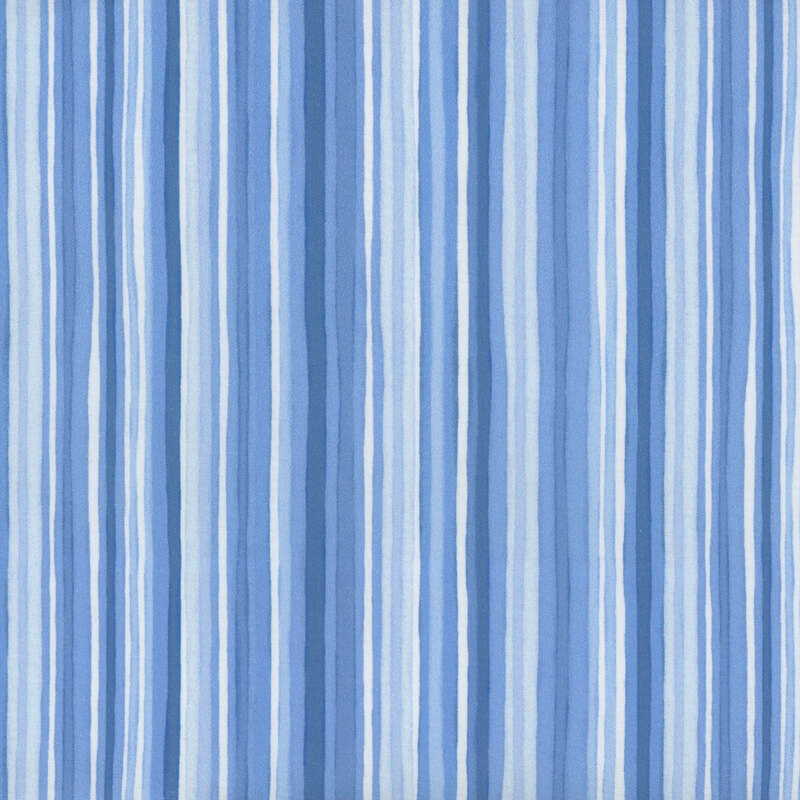 Blue and white striped fabric with stripes of varying thicknesses and shades.