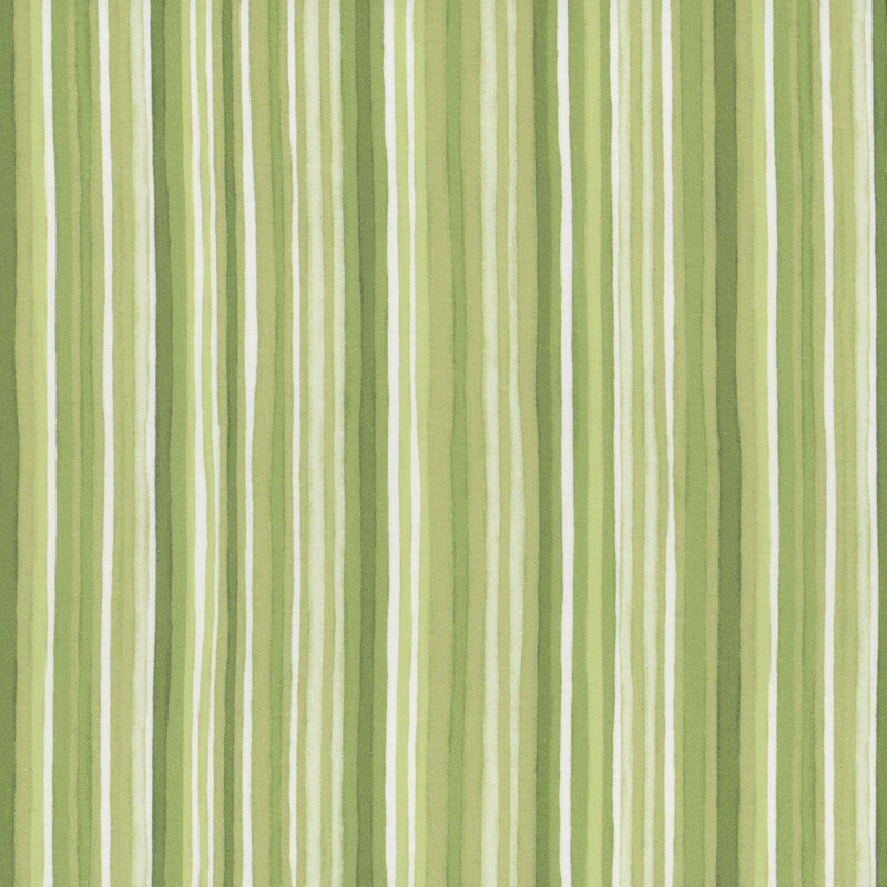 Green and white striped fabric with stripes of varying thicknesses and shades.