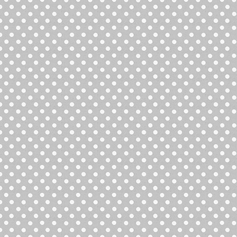 White polka dots on gray fabric.