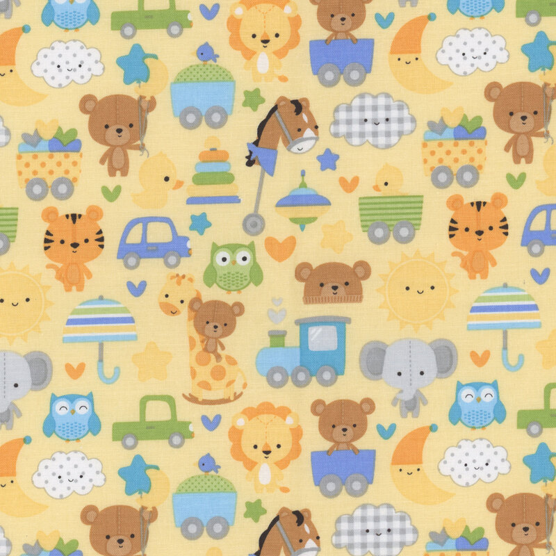 Yellow fabric with baby animals, toys, and celestial icons all over