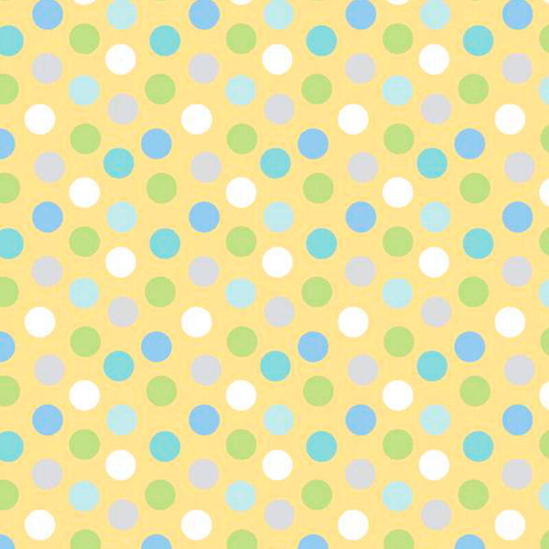Yellow fabric with blue, green, and white polka dots.