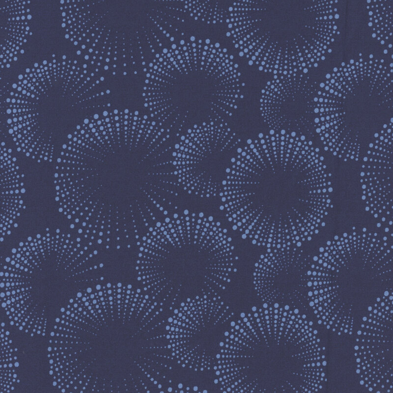 Navy fabric with lighter blue dotted fireworks.