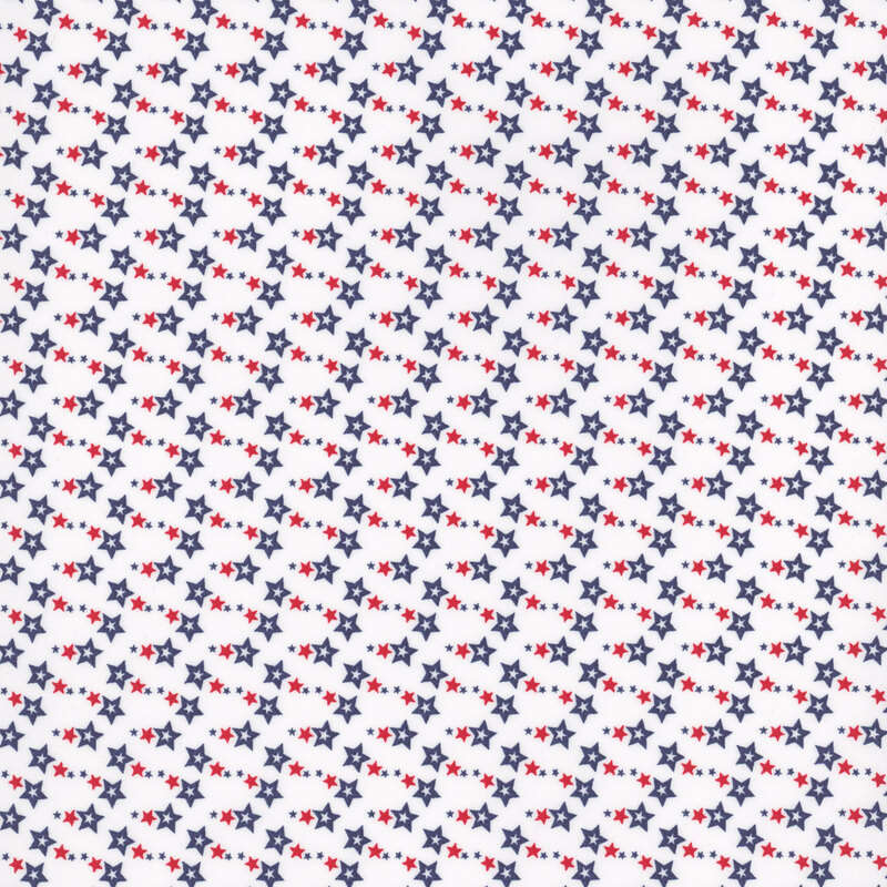 White fabric with tiny stars in red and blue.
