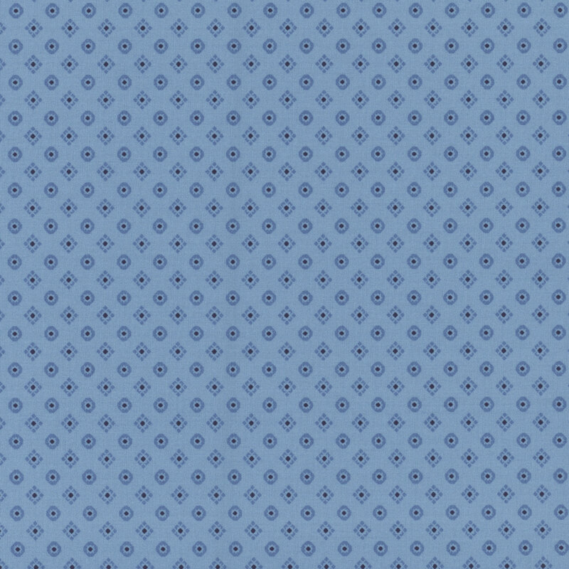 Denim blue fabric with tonal dark blue diamonds and rounded squares