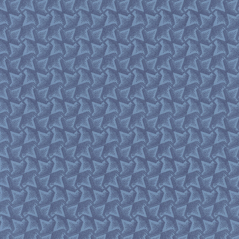Denim blue fabric with tonal woven dotted stars in blue.