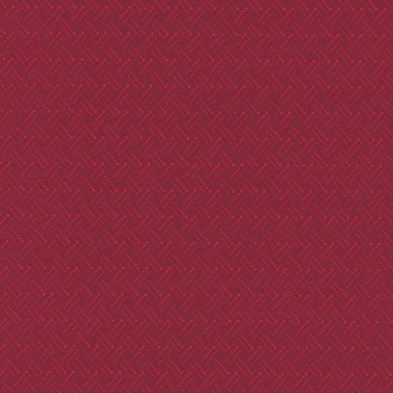 Deep burgundy fabric with tiny red dots in a basket weave design.