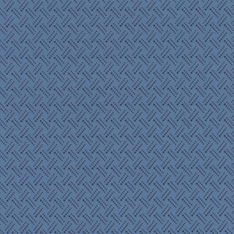 Denim blue fabric with tiny dark blue dots in a basket weave design.