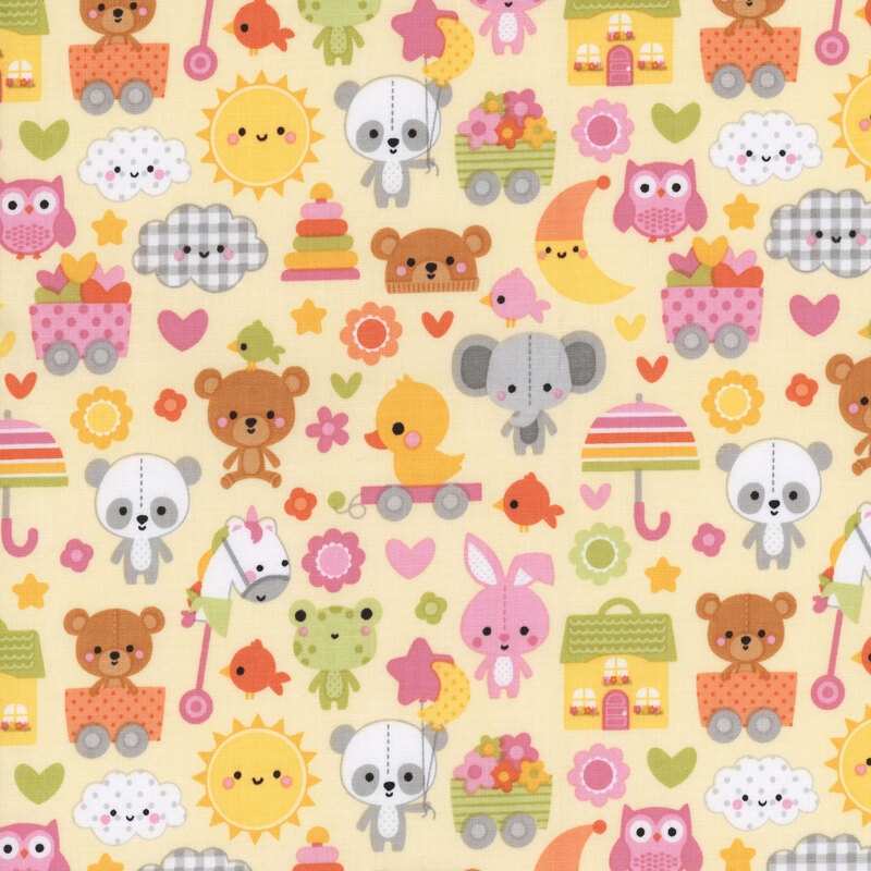 pastel yellow fabric features adorable stuffed animals, toys, suns, moons, and other cute motifs