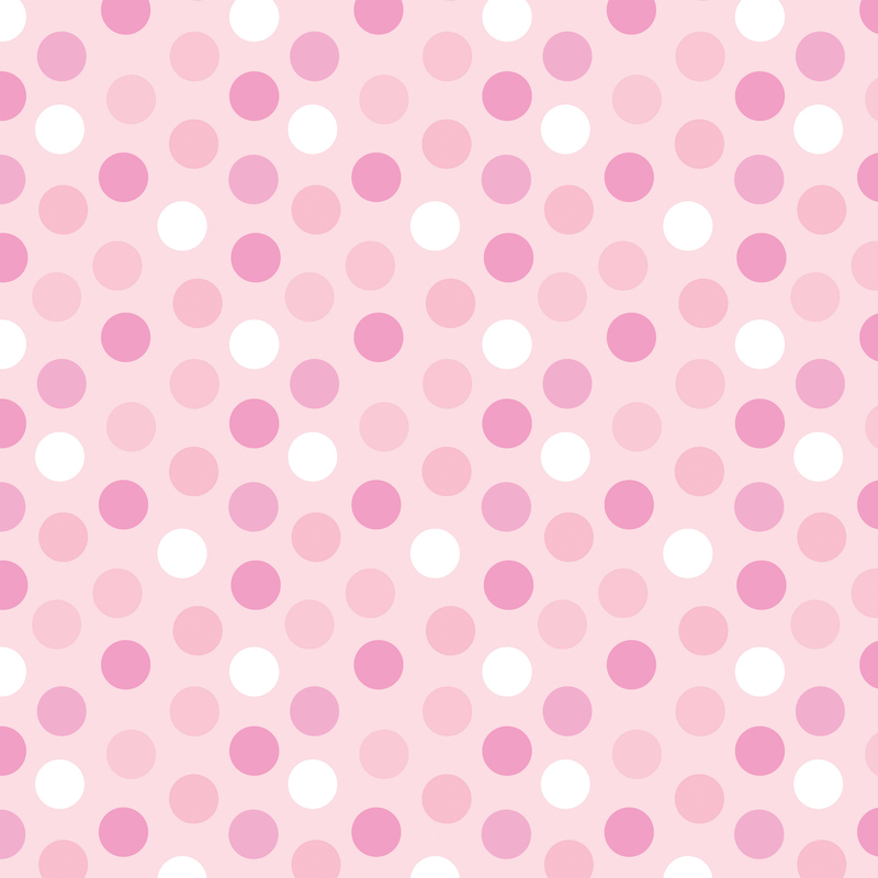 soft pink fabric featuring medium polka dots in white and darker shades of pink