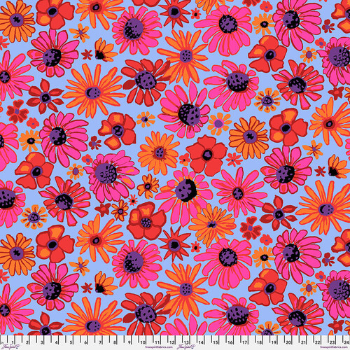 Periwinkle fabric with bright, varying tossed orange and red florals.