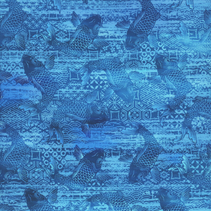 lovely blue fabric featuring dark blue textured patterning and scattered dark blue koi fish