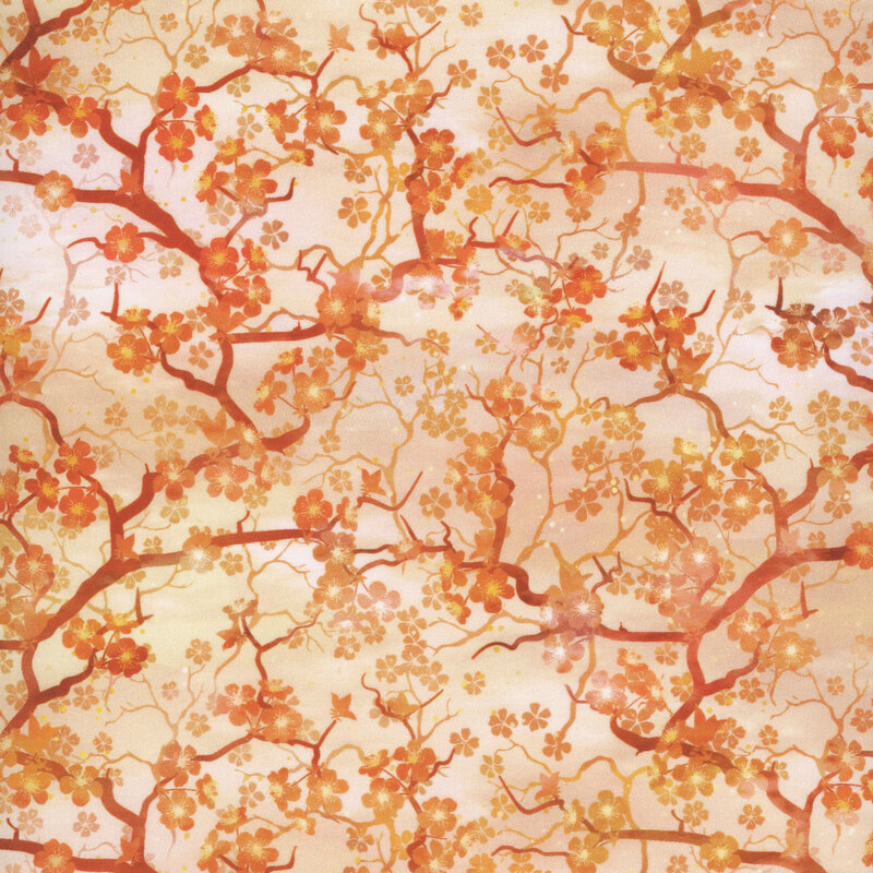 beautiful light orange mottled fabric features orange flowering cherry blossom branches