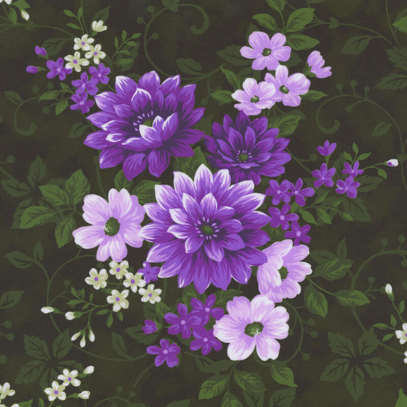 Green fabric with tonal vines and leaves and clusters of purple flowers.