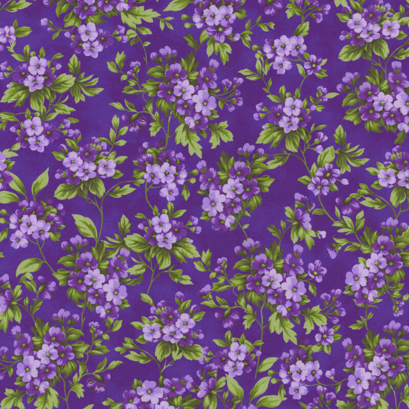 Purple fabric with clusters of small purple flowers.