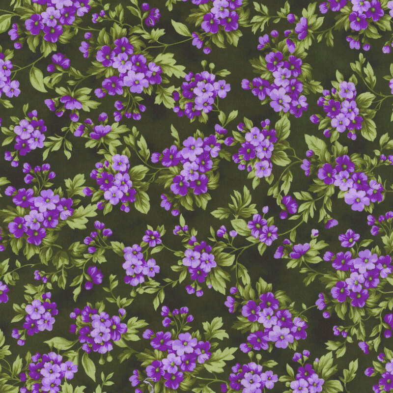 Deep green fabric with clusters of small purple flowers.