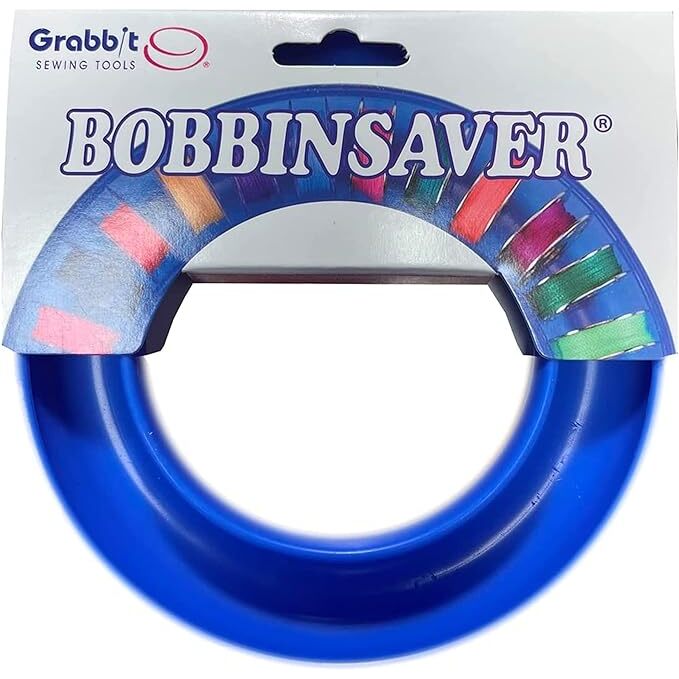 The blue BobbinSaver in its packaging, isolated on a white background.