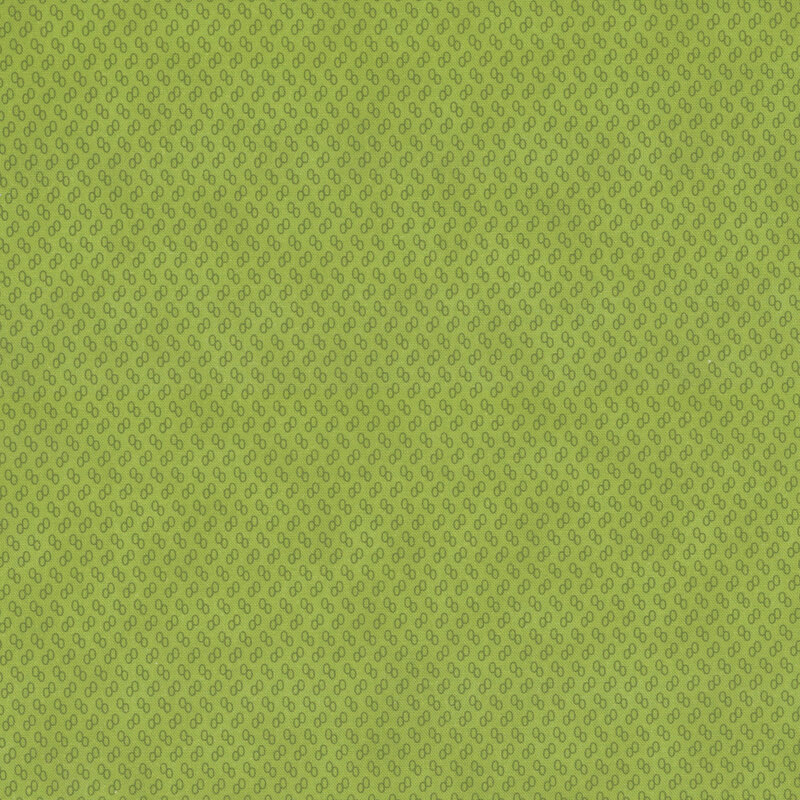 Light green fabric with tiny green ovals.