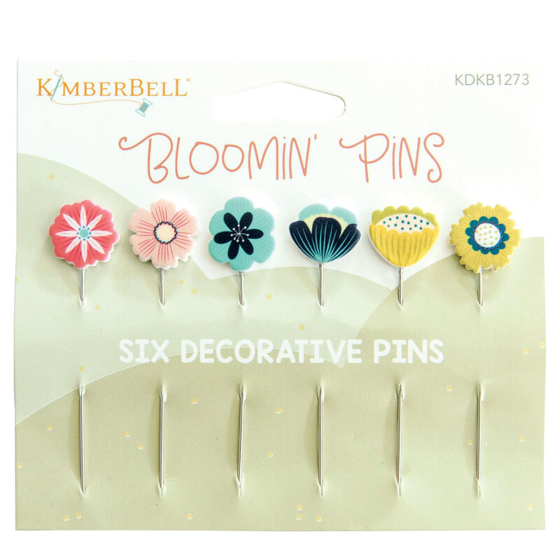 Photo of pins in packaging showing the 6 different flowers