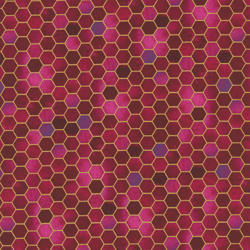 Fuchsia mottled fabric with metallic gold accents in a hexagon tiled pattern