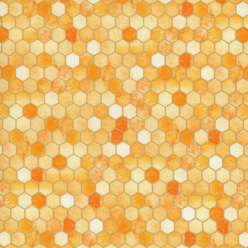 Golden yellow mottled fabric with metallic gold accents in a hexagon tiled pattern, like a honeycomb