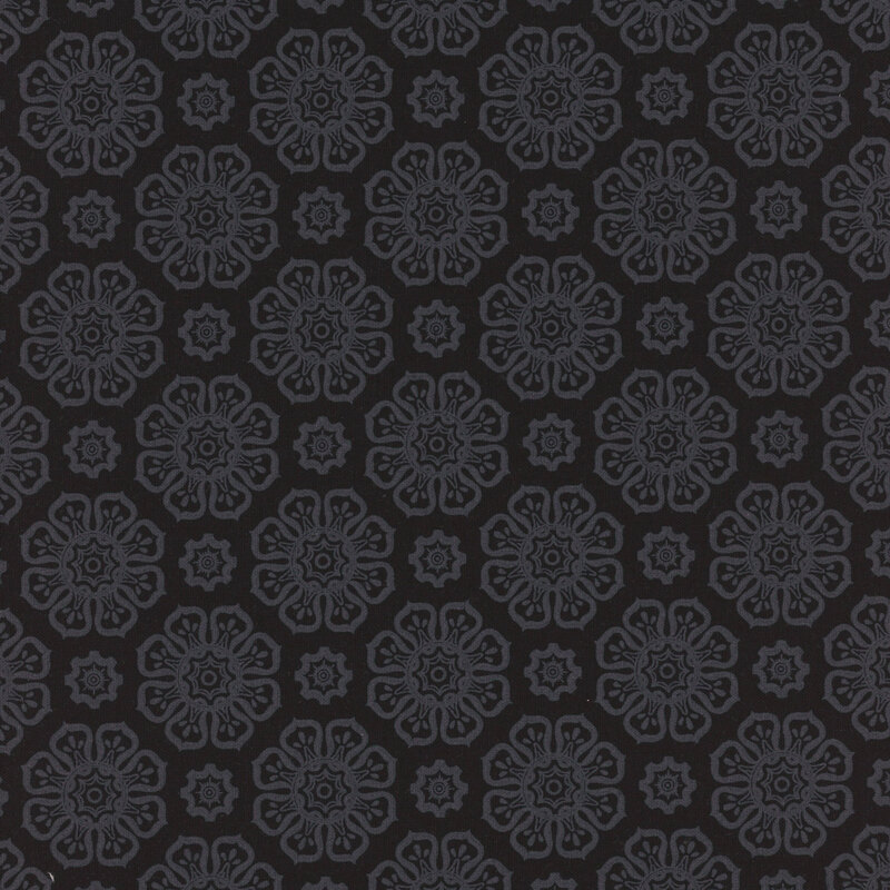 Black fabric with gray floral motifs evenly spaced apart