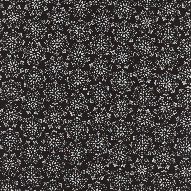Black fabric with white round flowers packed together all over