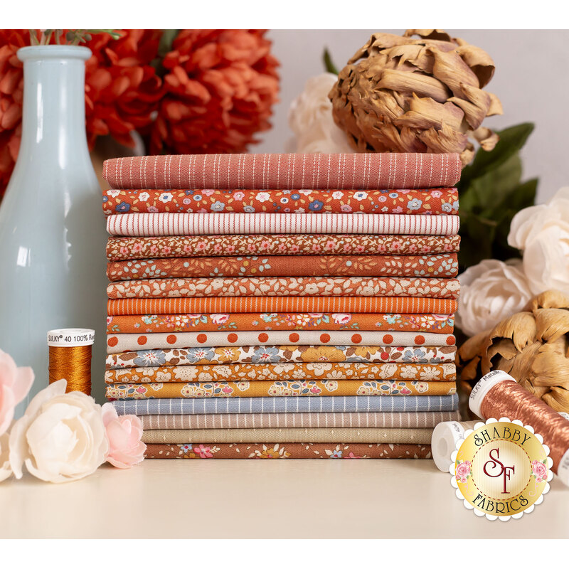 stack of Autumn fabrics in the Creating Memories collection