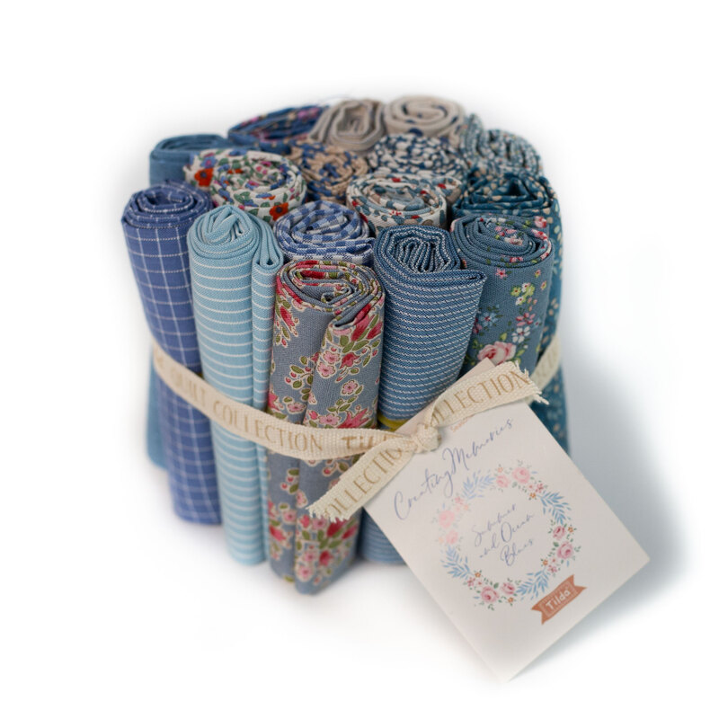 cluster of rolled up Summer fabrics in the Creating Memories fat eighth set