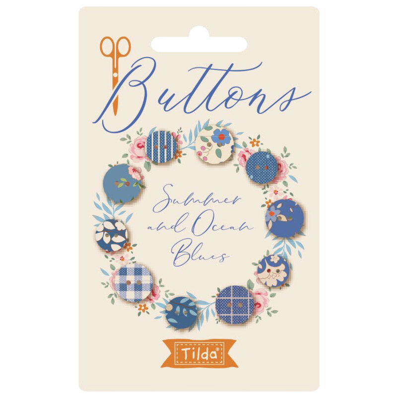 Image of a card with Summer and Ocean Blues fabric covered buttons arranged in a circle