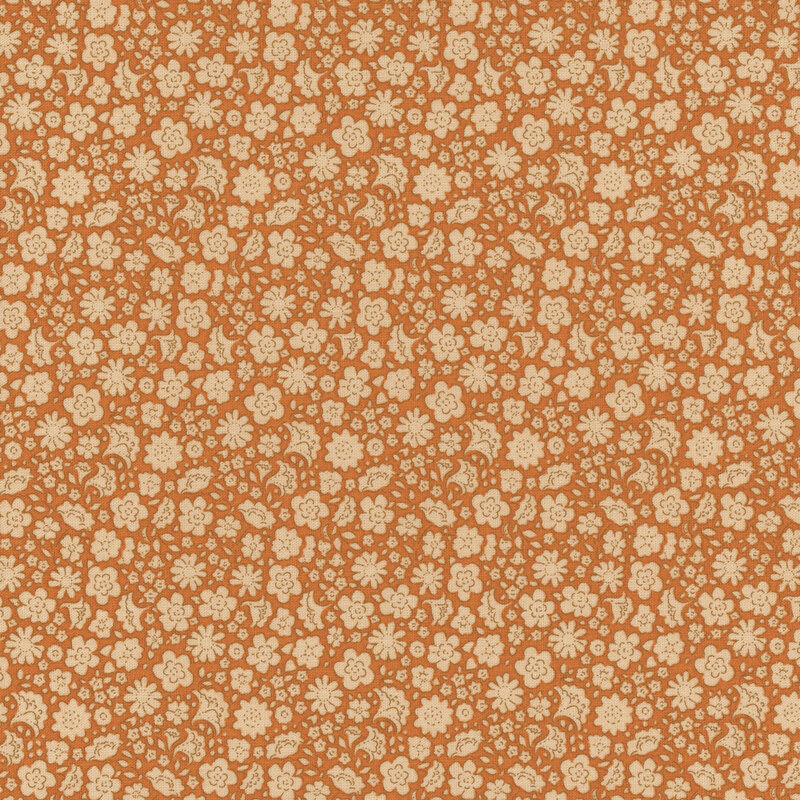 Orange fabric featuring small tossed cream flowers