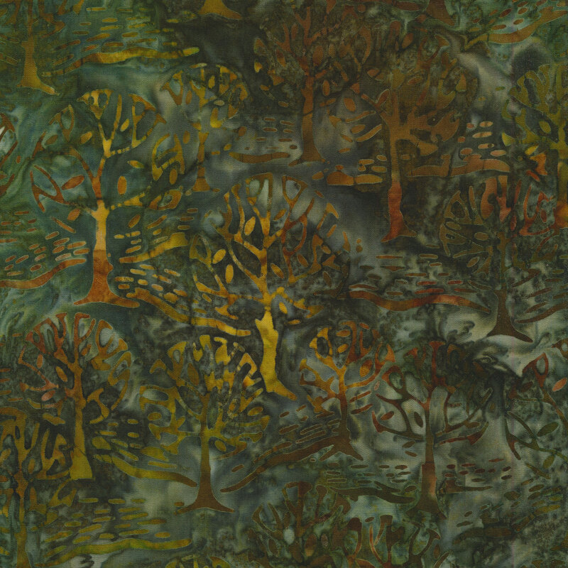 Deep green mottled fabric with a forest of mottled brown and yellow trees.