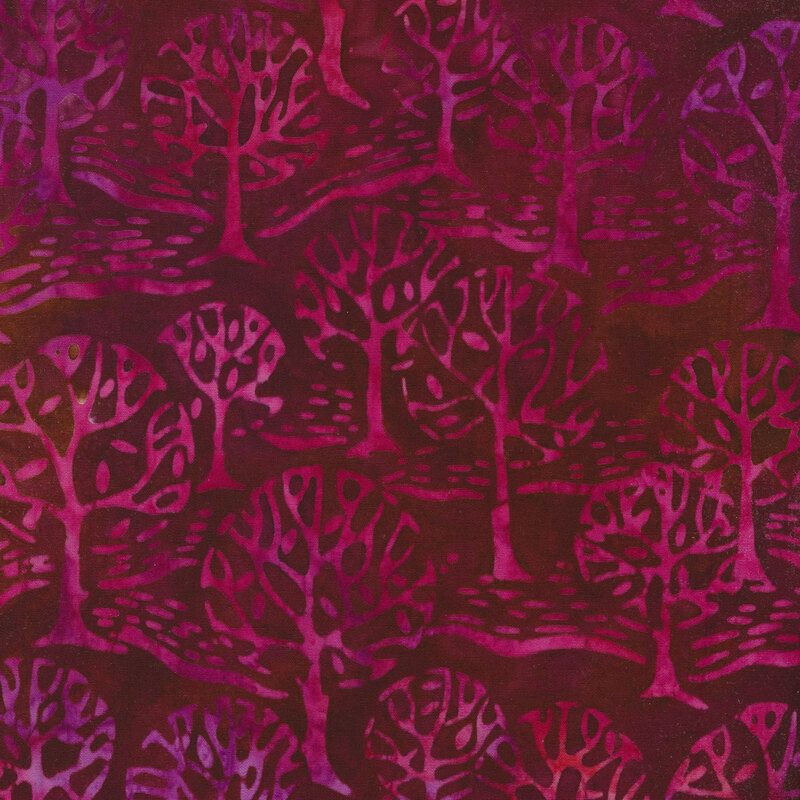 Merlot mottled fabric with a forest of mottled purple and magenta trees.