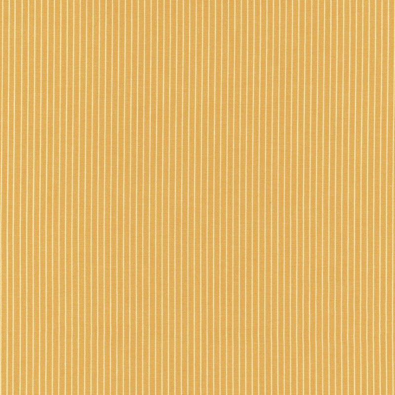 Yellow and white striped fabric featuring narrow stripes